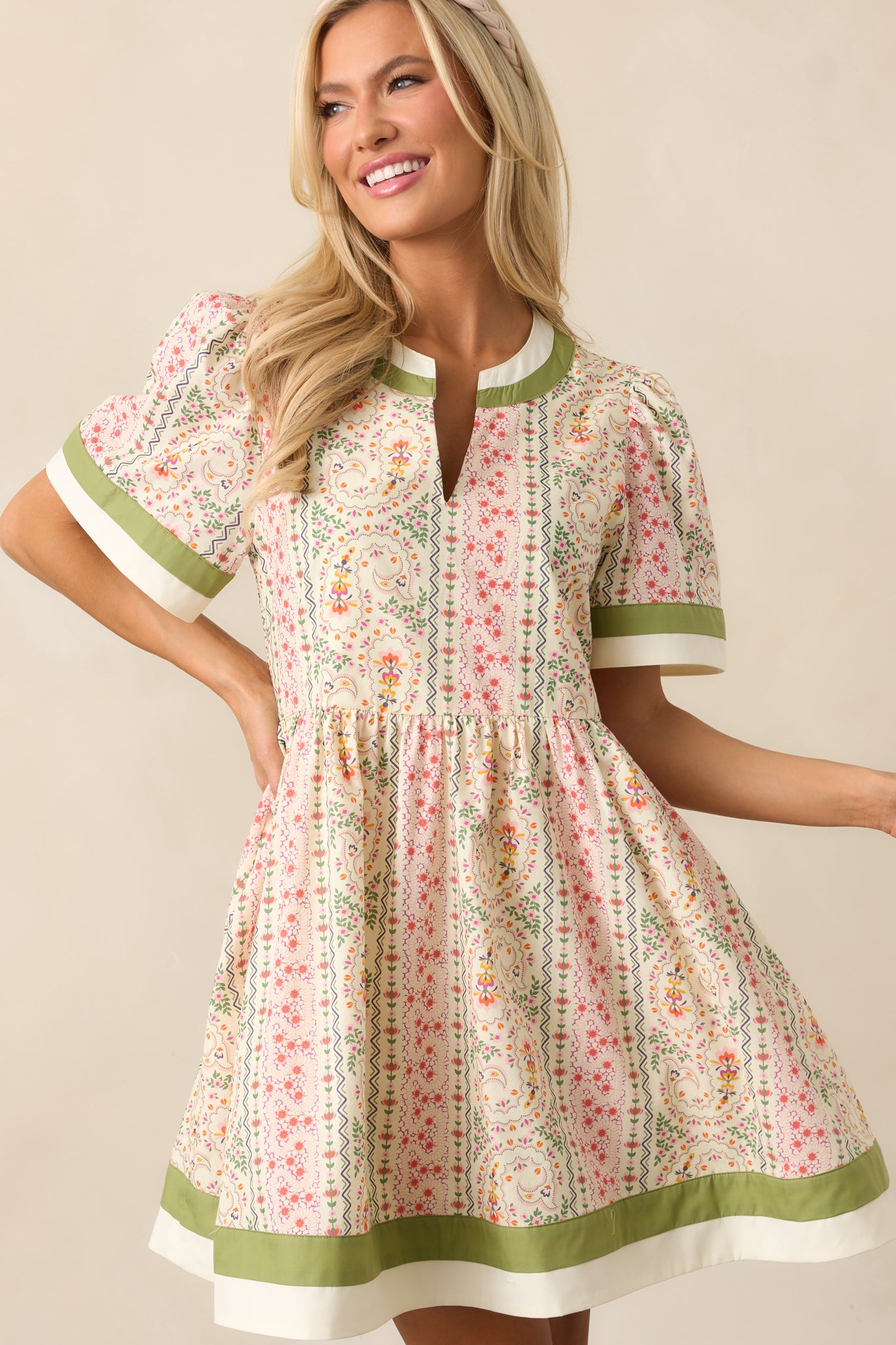 A soft, flowing fabric gives this relaxed-fit mini dress a light and effortless feel.