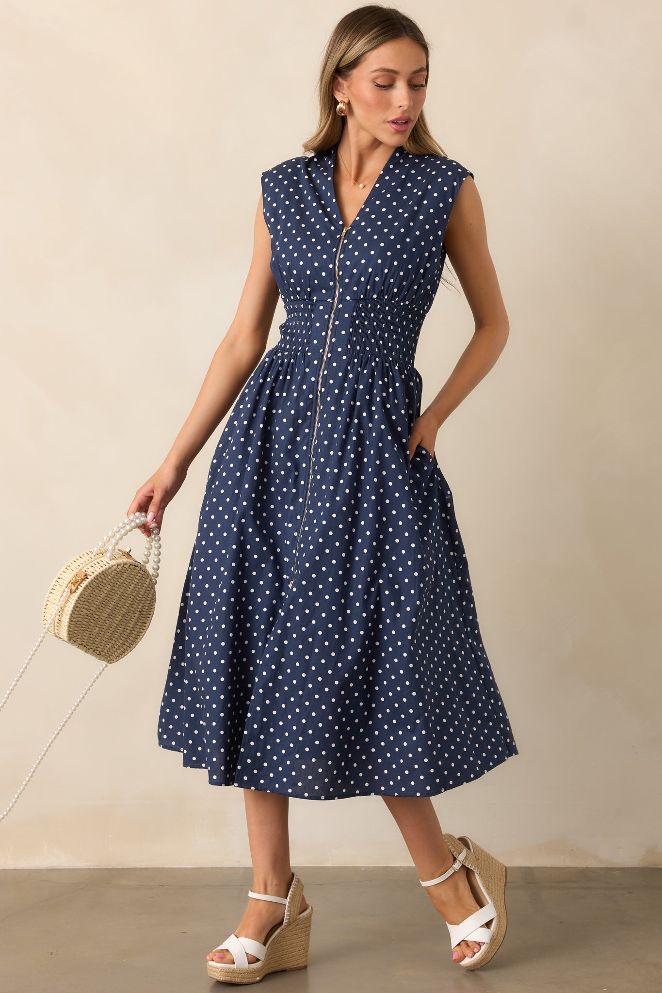 The Evette Navy Polka Dot Zip Front Midi Dress