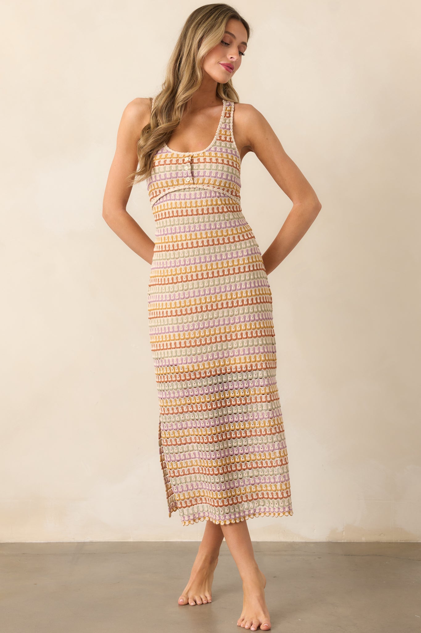 Natural multi dress with a scoop neckline and crochet racerback design, offering a stylish, relaxed fit.