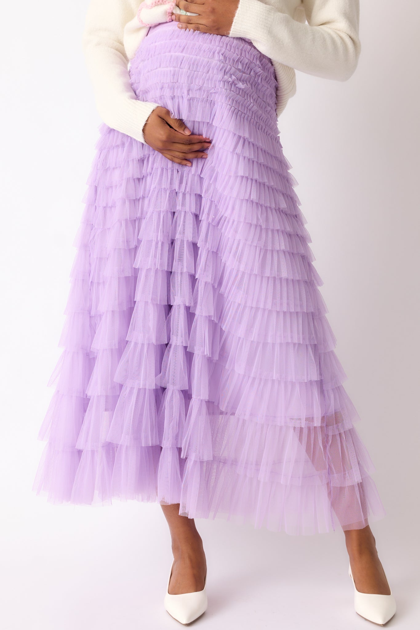 Cropped view of the lavender skirt highlighting the elastic waistband and the soft texture of the layered tulle fabric.